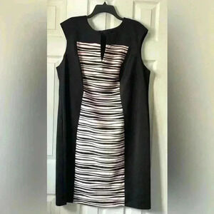 Connected Apparel  black dress, center stripes for hourglass shaping, size 20W